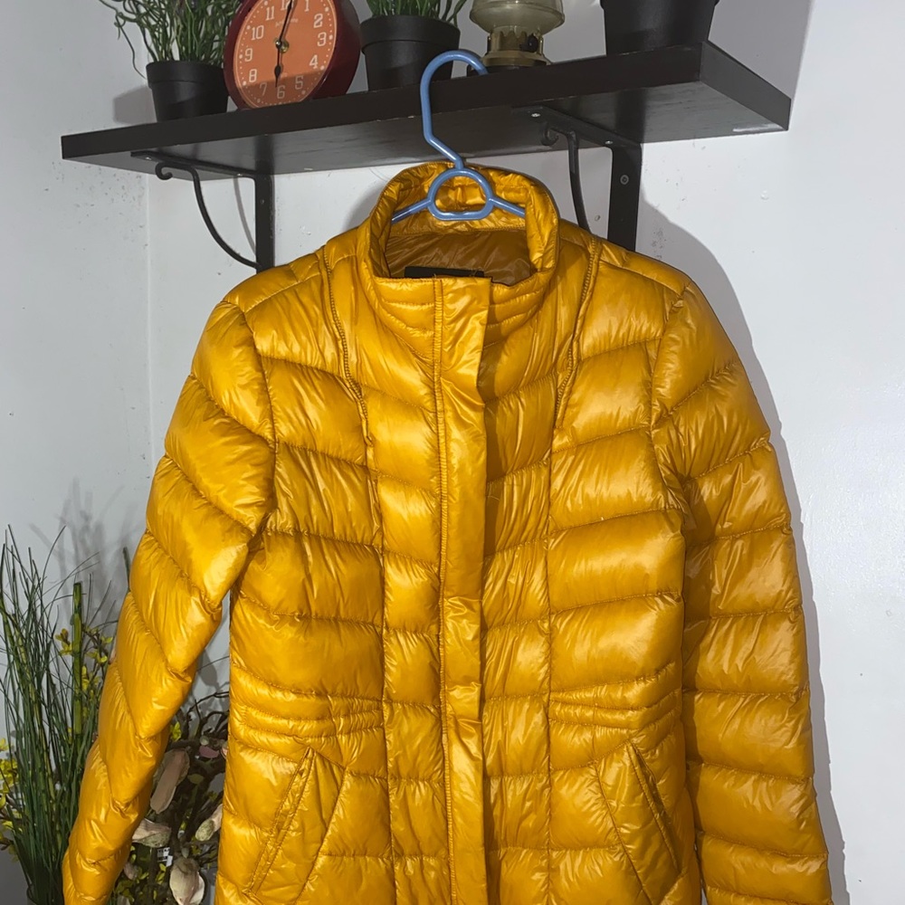RAINFOREST jacket, super cute orange and so warm. Only worn a few times